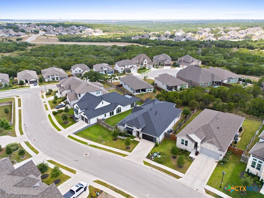 412 Pin Cherry Pass San Marcos, TX 78666 - Photo 39 of 47 an aerial view of residential houses with outdoor space