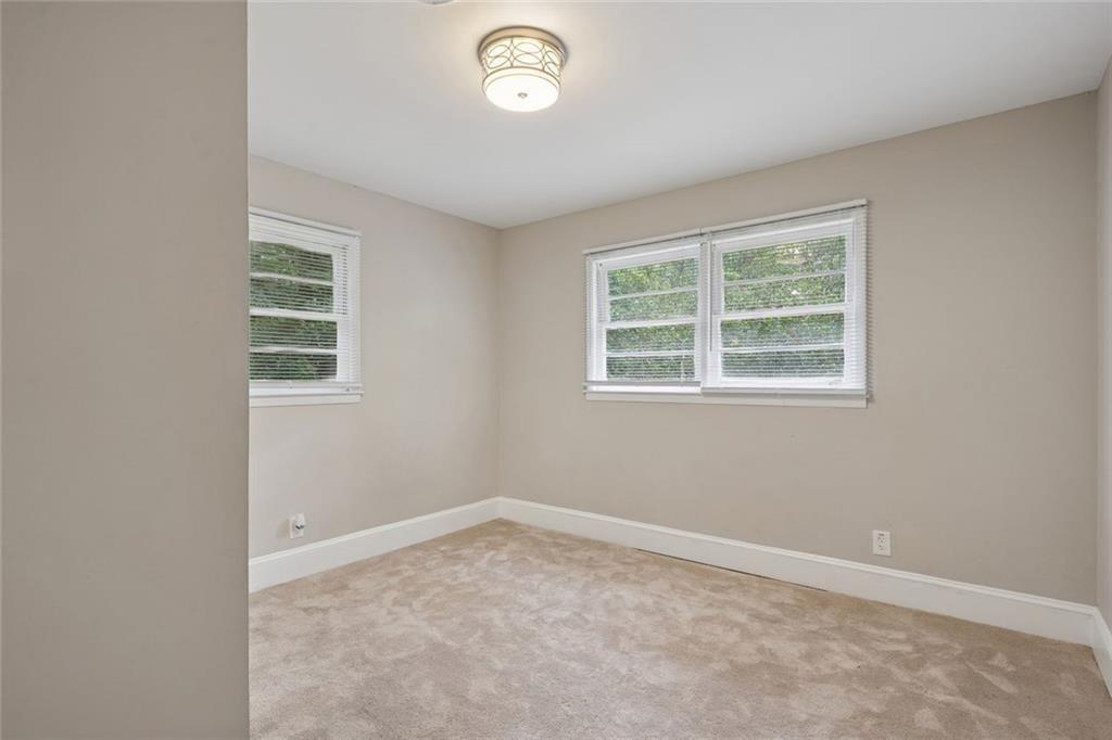 4136 Weelaunee Road Ellenwood, GA 30294 - Photo 15 of 22 an empty room with a window