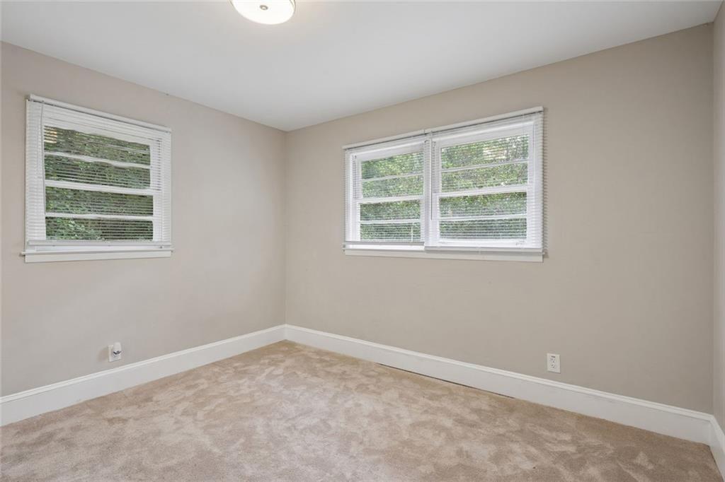4136 Weelaunee Road Ellenwood, GA 30294 - Photo 16 of 22 an empty room with a window