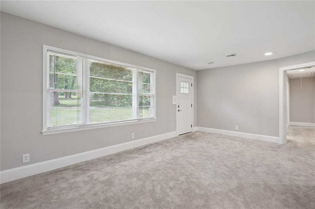 4136 Weelaunee Road Ellenwood, GA 30294 - Photo 4 of 22 an empty room with a window
