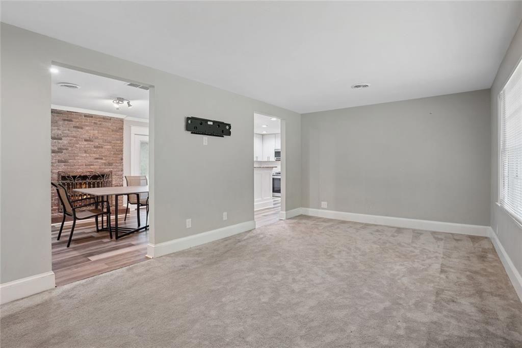 4136 Weelaunee Road Ellenwood, GA 30294 - Photo 5 of 22 a view of an empty room with a window