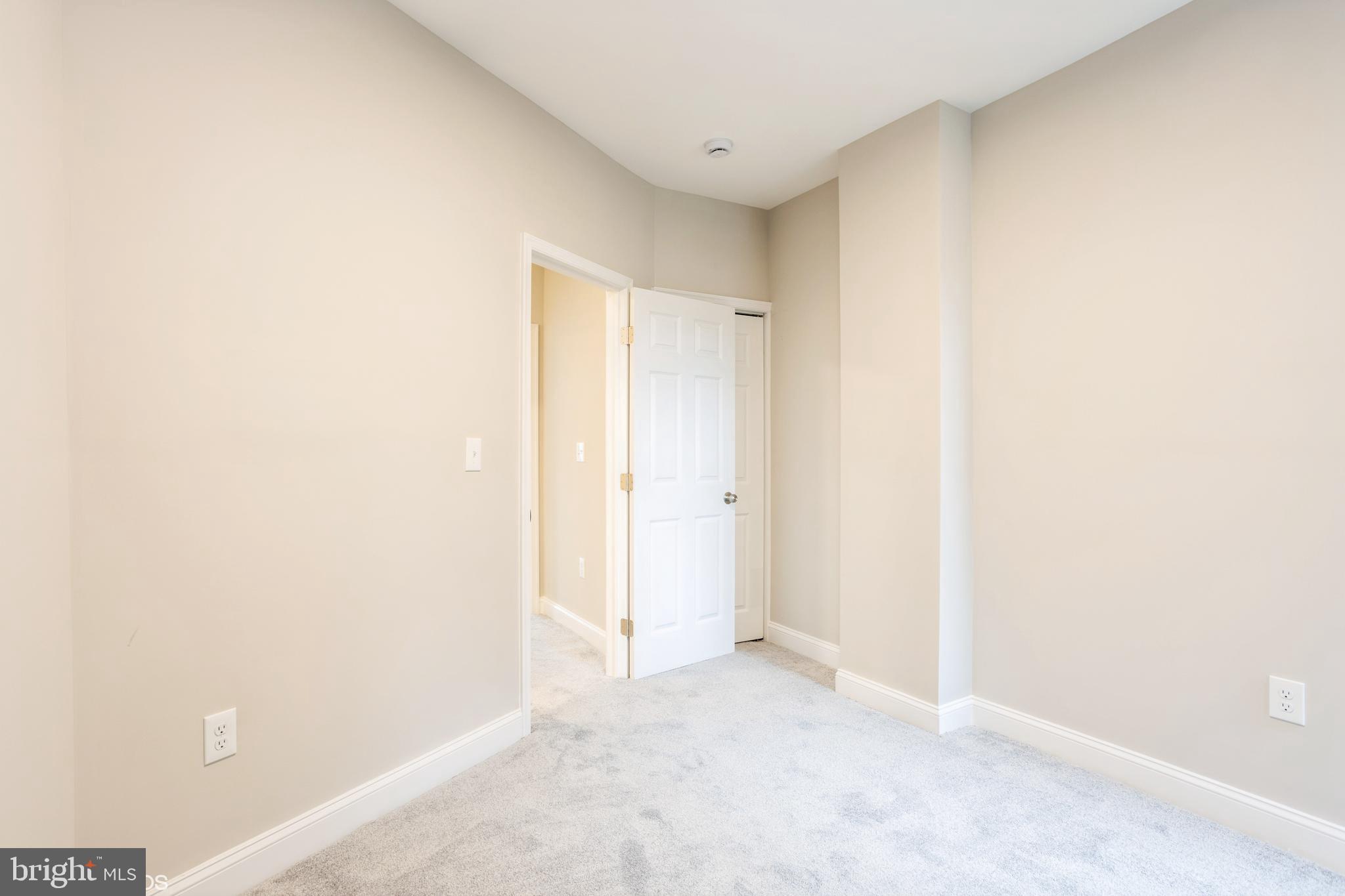 3025 Walbrook Avenue Baltimore, MD 21216 - Photo 12 of 16 a view of an empty room