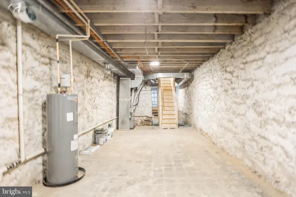 a view of a room with wooden walls