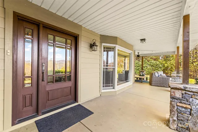 a view of a entryway door front of a house