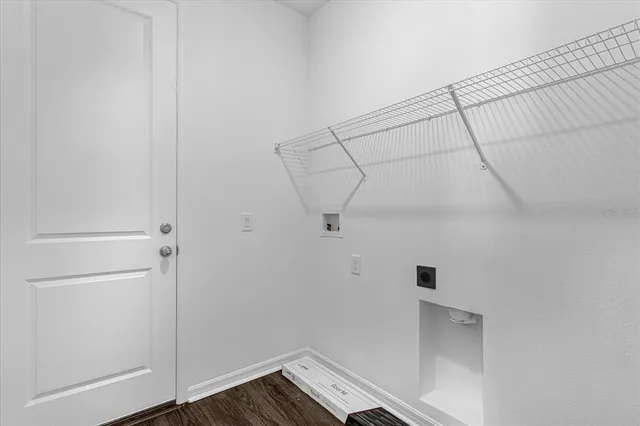 a view of a room with racks on the wall