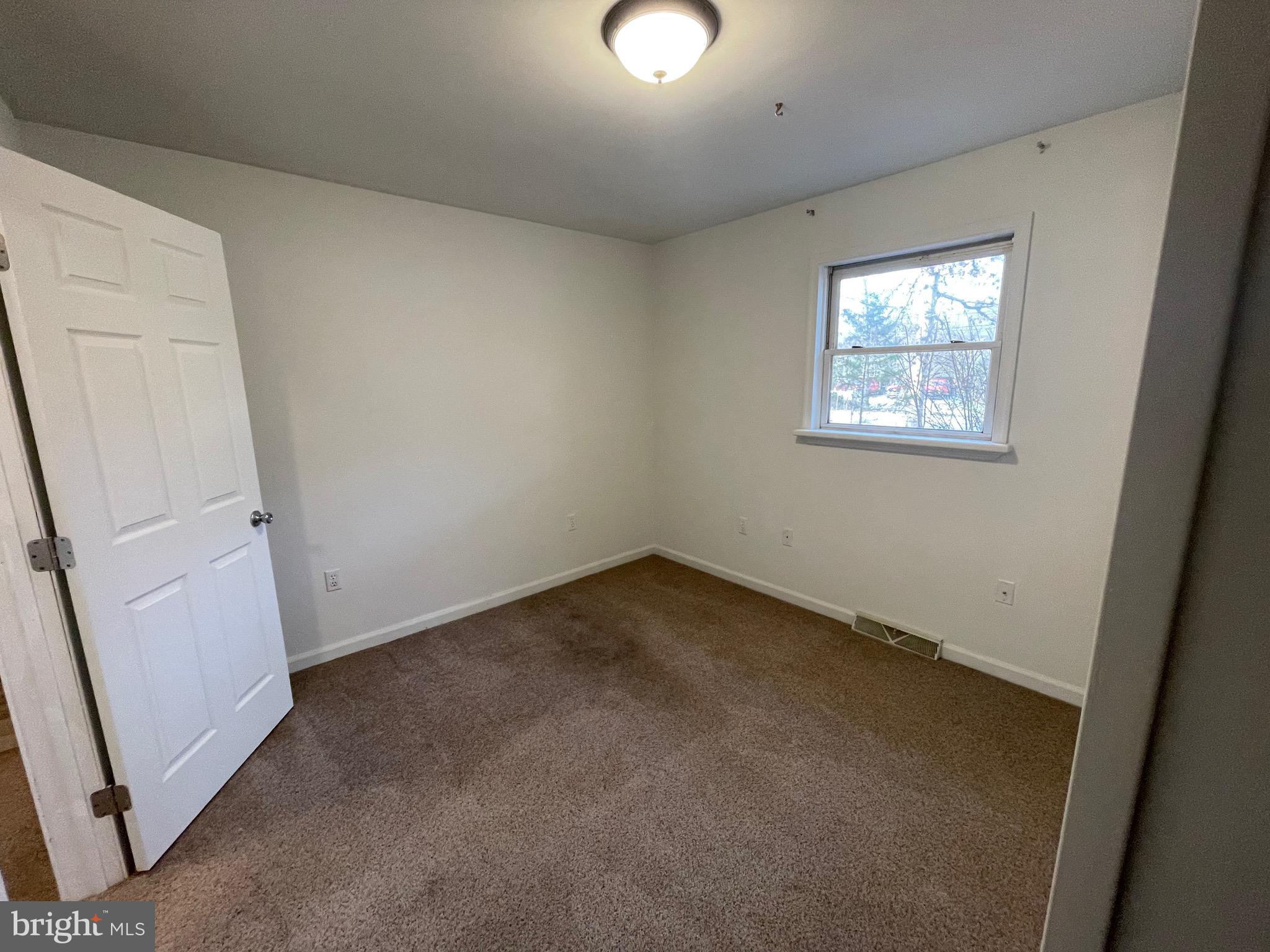 3266 Rosstown Road Wellsville, PA 17365 - Photo 22 of 31 an empty room with a window