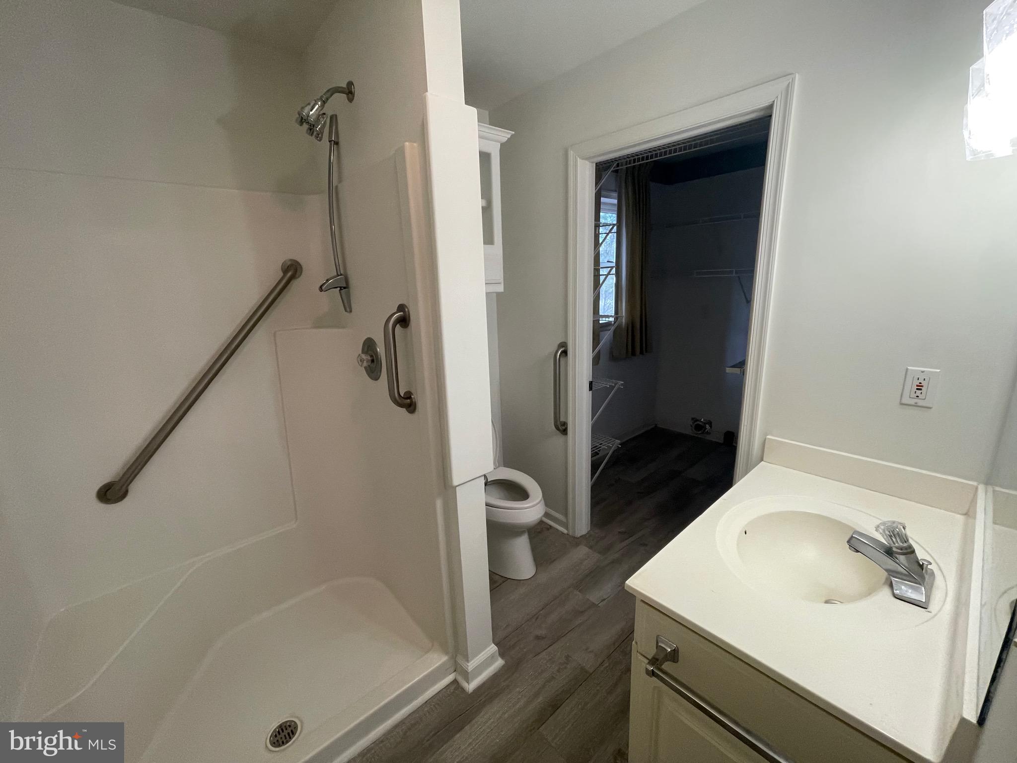 3266 Rosstown Road Wellsville, PA 17365 - Photo 25 of 31 a bathroom with a sink a toilet and shower
