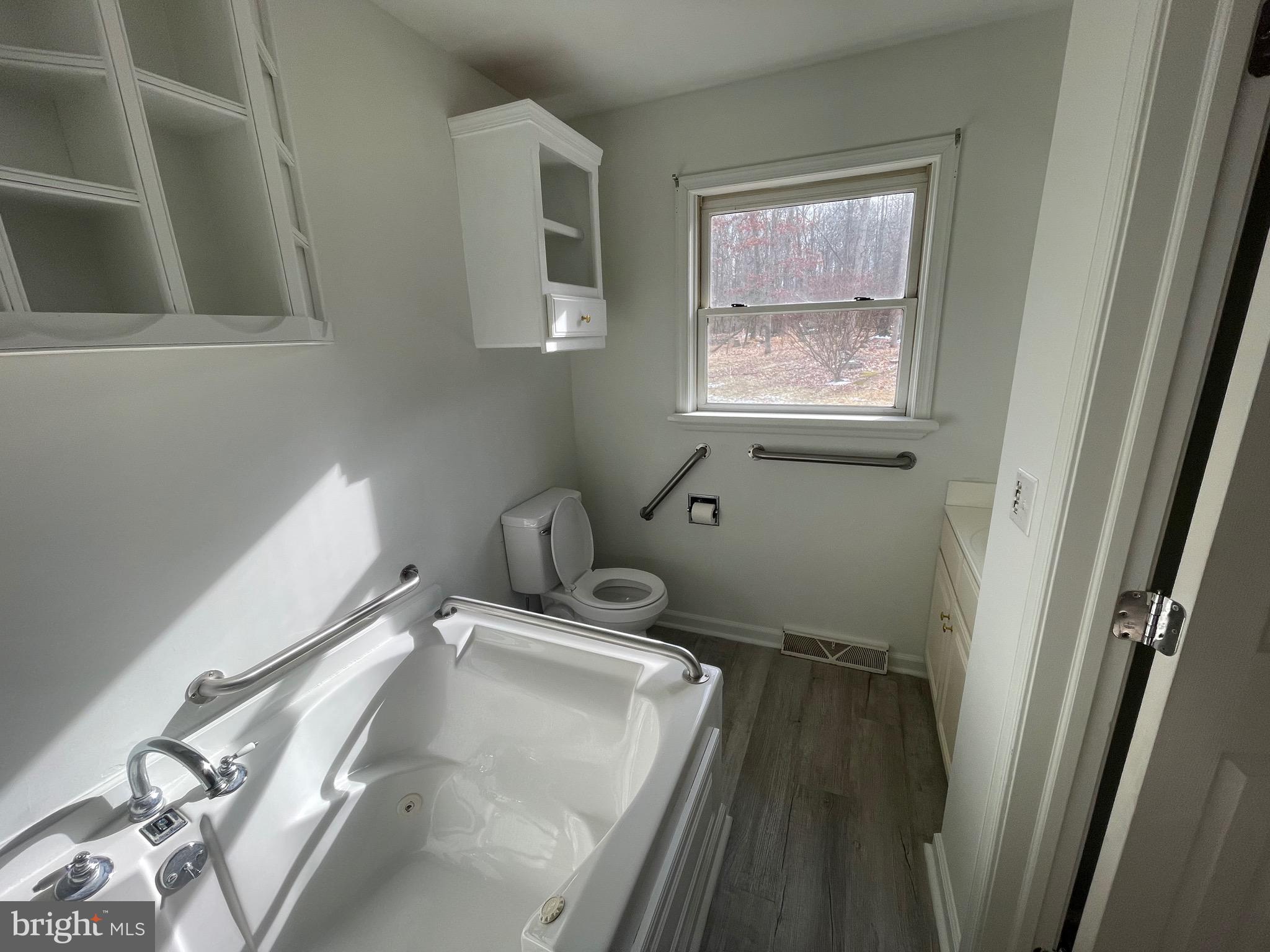 3266 Rosstown Road Wellsville, PA 17365 - Photo 29 of 31 a bathroom with a sink and a window
