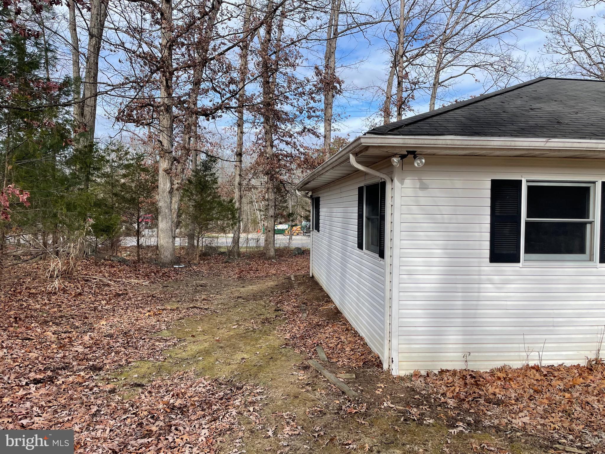3266 Rosstown Road Wellsville, PA 17365 - Photo 7 of 31 a view of a house with a yard
