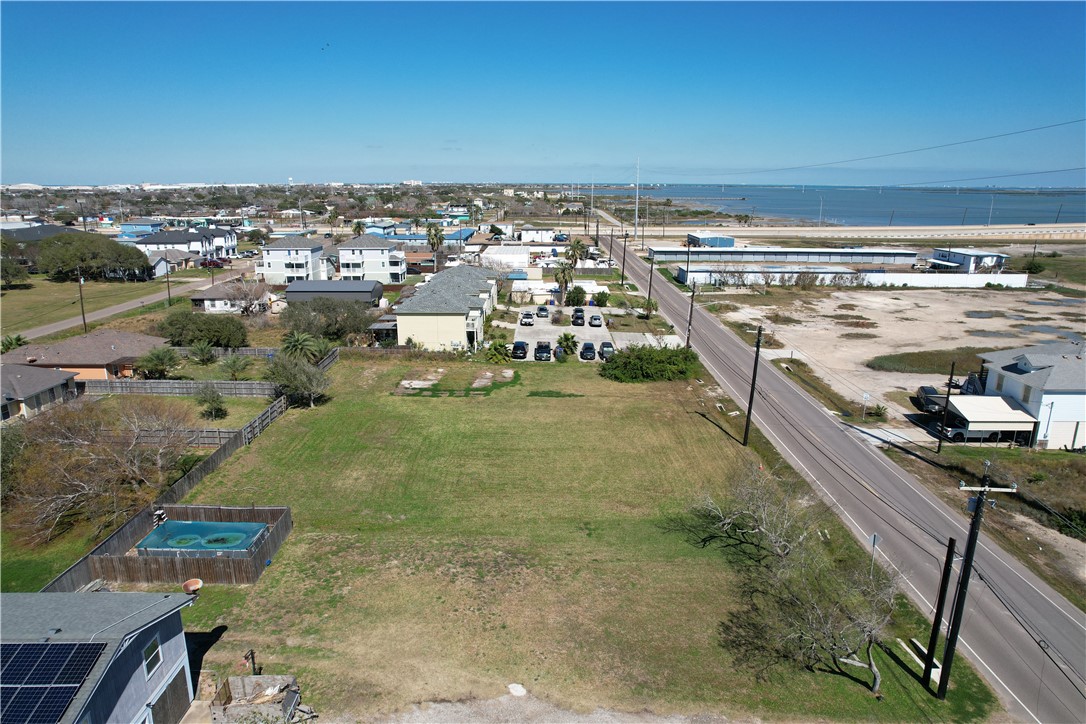 1222 Laguna Shores Road Corpus Christi, TX 78418 - Photo 6 of 7 a view of a swimming pool with a yard