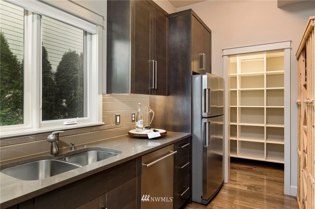 212 5th Avenue West Kirkland, WA 98033 - Photo 17 of 36 a kitchen with a sink and a window
