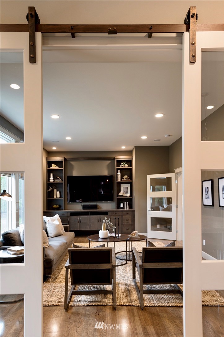 212 5th Avenue West Kirkland, WA 98033 - Photo 19 of 36 a living room with furniture and a flat screen tv