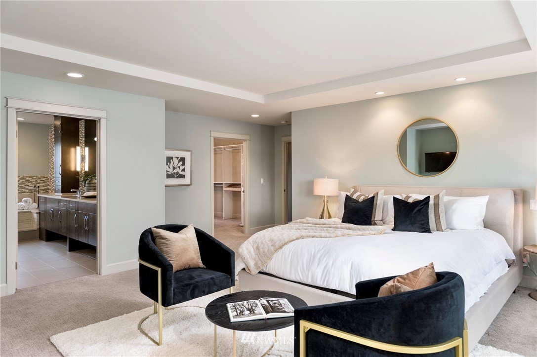 212 5th Avenue West Kirkland, WA 98033 - Photo 25 of 36 a bedroom with a bed and couch