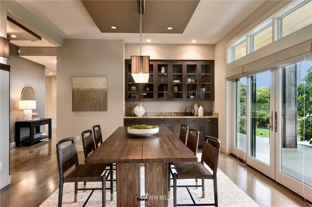 212 5th Avenue West Kirkland, WA 98033 - Photo 8 of 36 a view of a dining room with furniture window and wooden floor