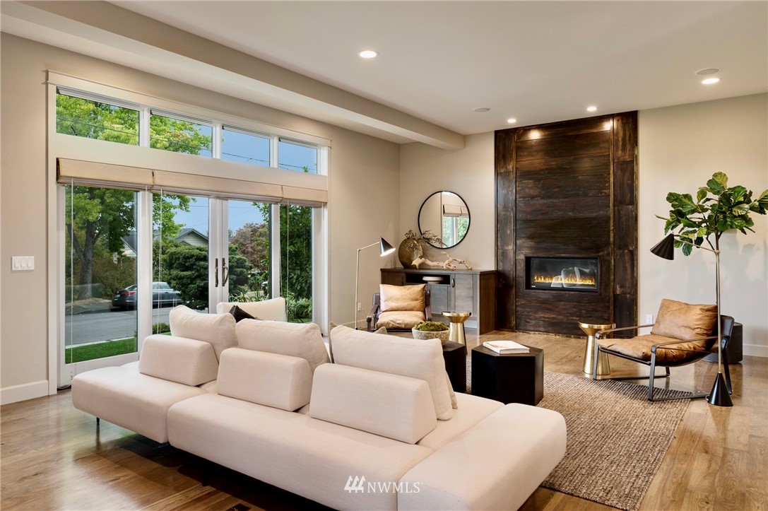212 5th Avenue West Kirkland, WA 98033 - Photo 10 of 36 a living room with furniture and a large window