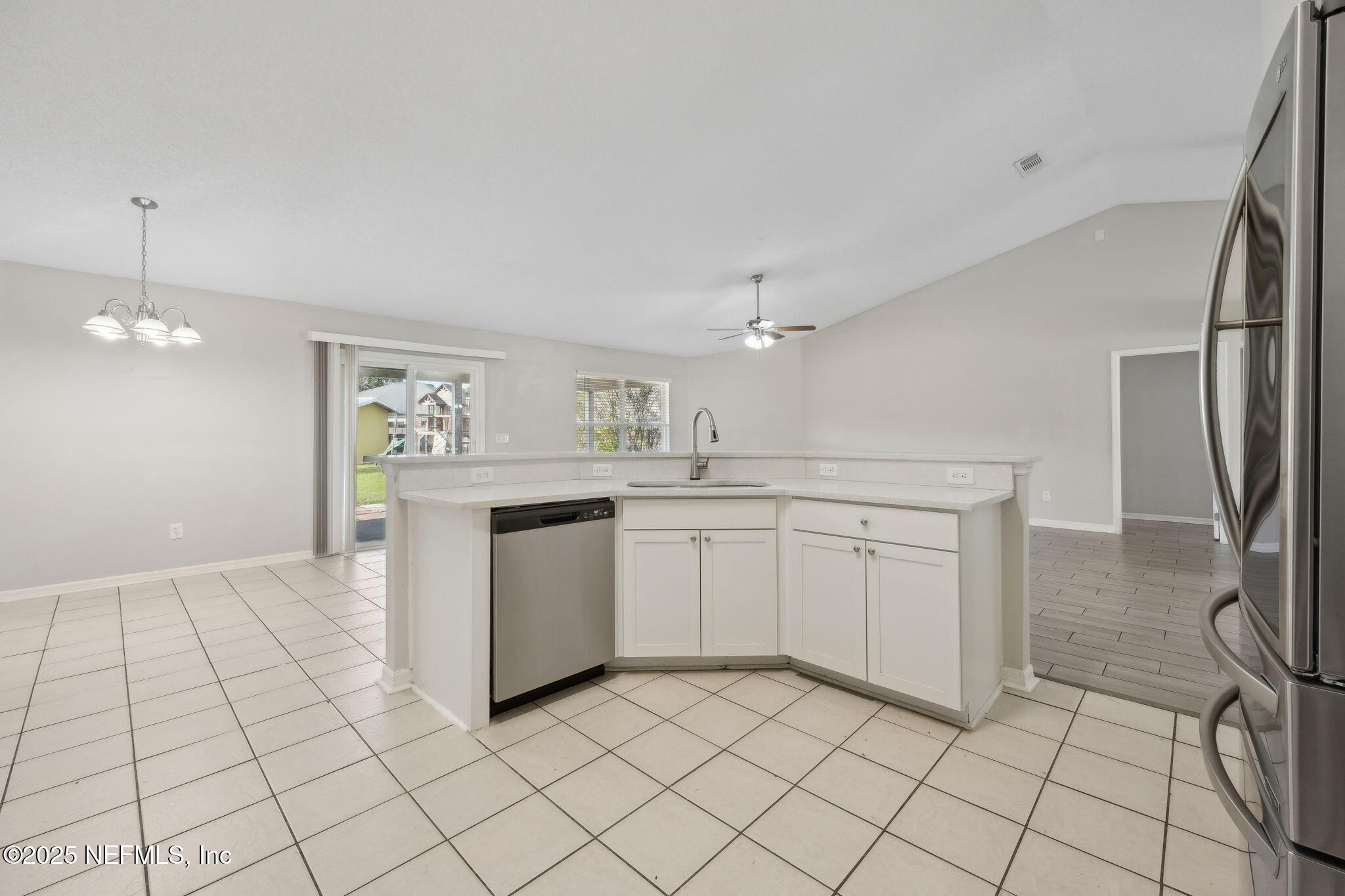 3446 Bristol Bridge Road Orange Park, FL 32073 - Photo 18 of 43 Kitchen island with breakfast bar
