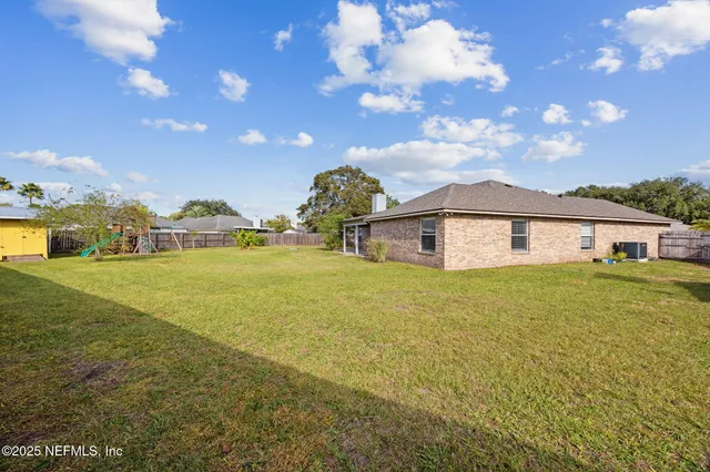a front view of house with yard