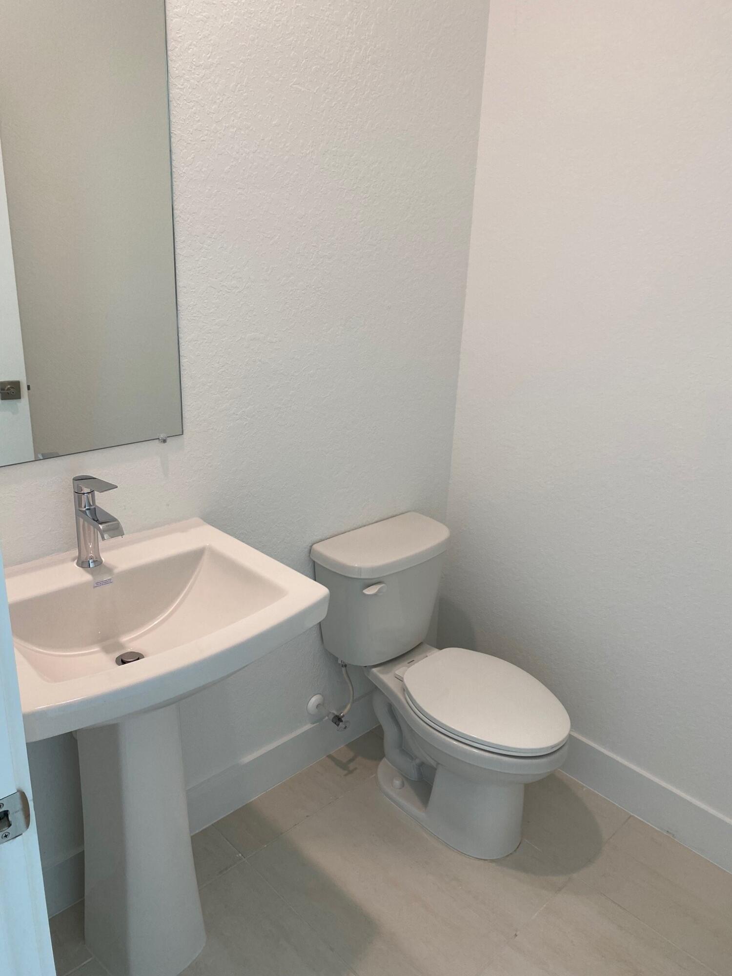 6800 Southeast Park Trace Drive Stuart, FL 34997 - Photo 7 of 12 PPT 38 Half bath