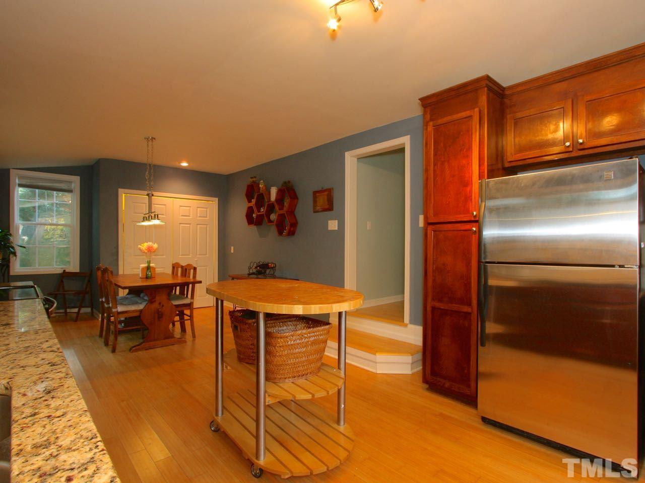 1310 Carpenter Fletcher Road Durham, NC 27713 - Photo 3 of 23 The island is on wheels.