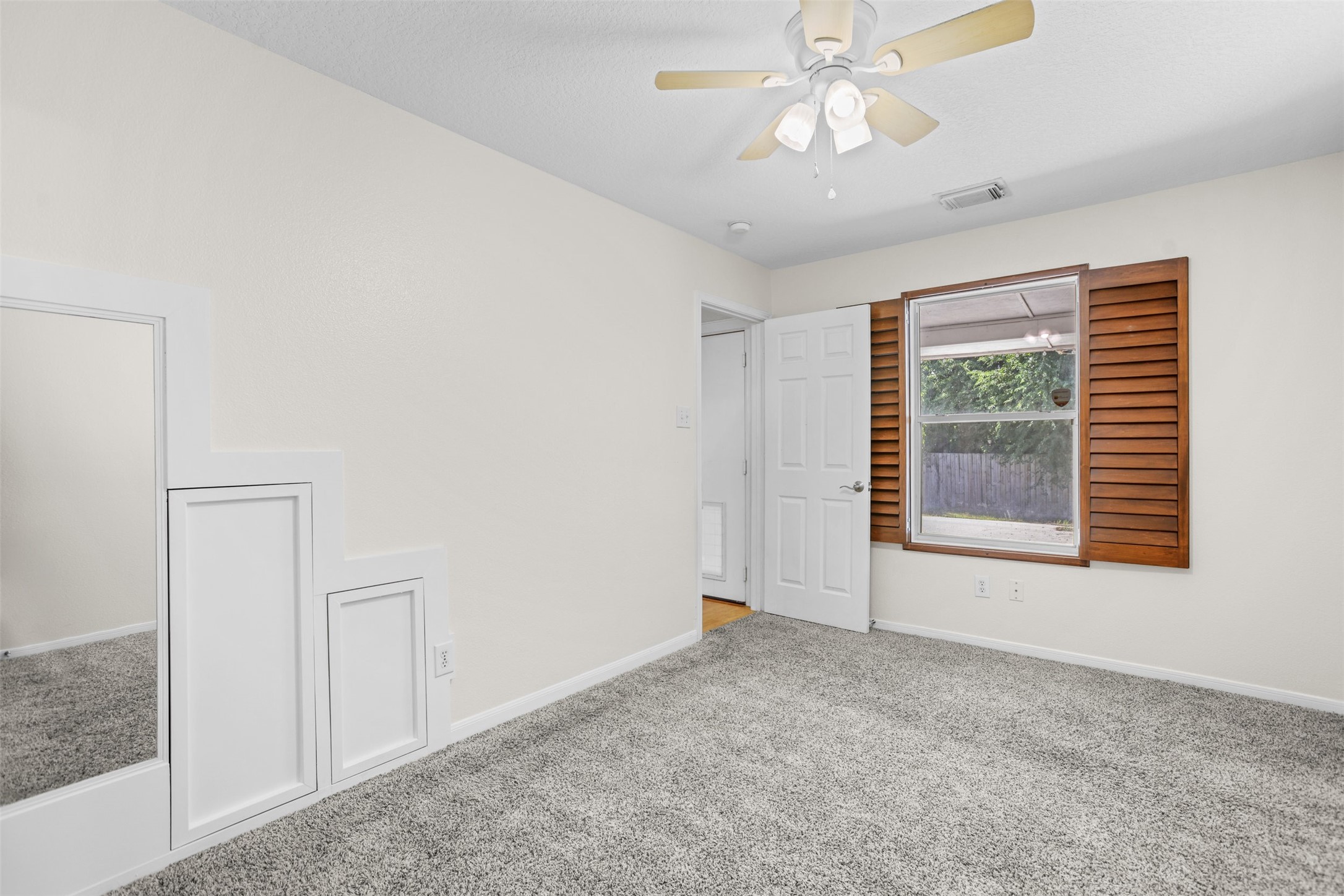 14808 Welbeck Drive Channelview, TX 77530 - Photo 16 of 36 a view of an empty room with a window