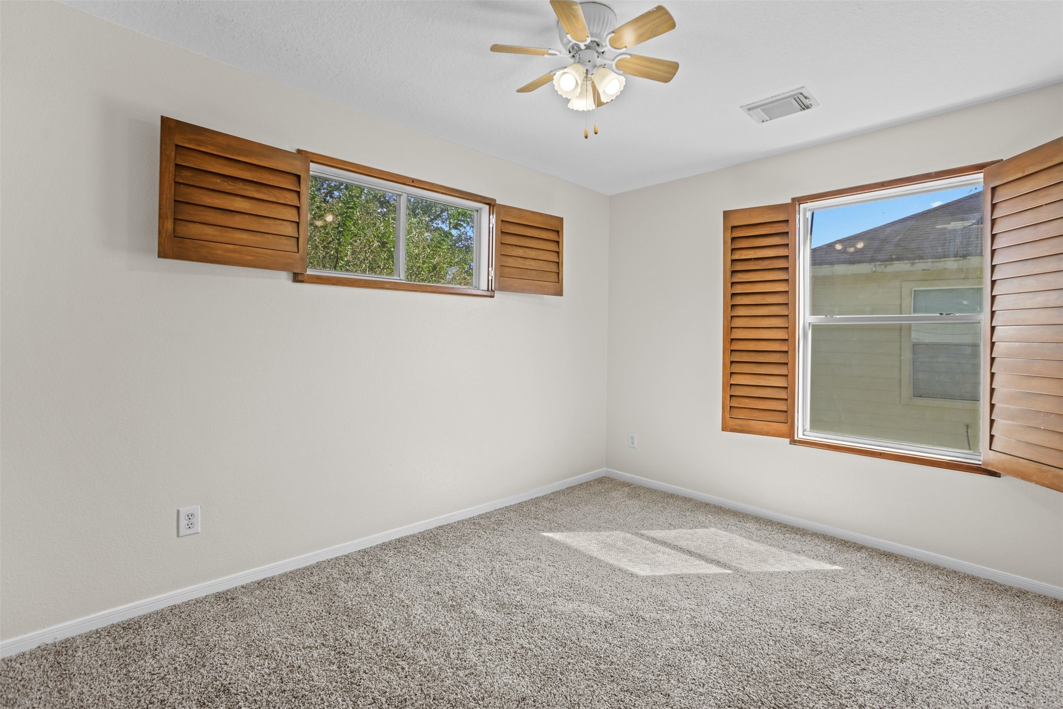 14808 Welbeck Drive Channelview, TX 77530 - Photo 25 of 36 a view of an empty room with a window
