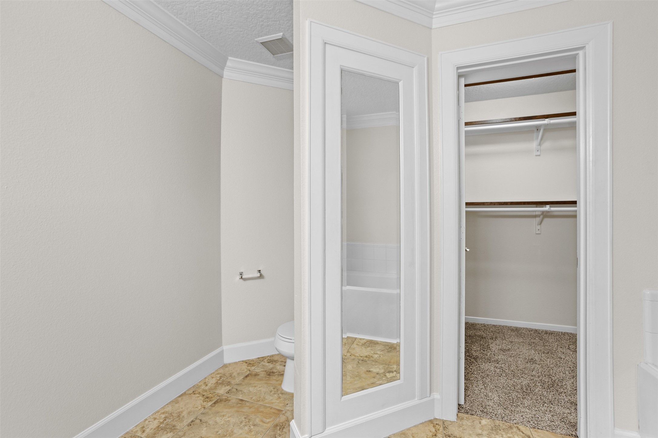 14808 Welbeck Drive Channelview, TX 77530 - Photo 32 of 36 a view of walk in closet with empty room