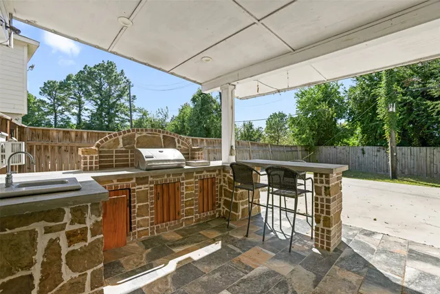 a house view with a backyard space