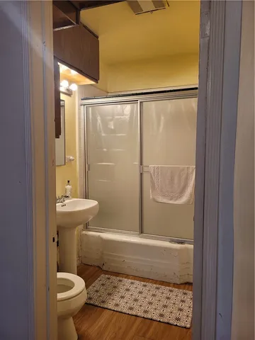 a bathroom with a sink and mirror