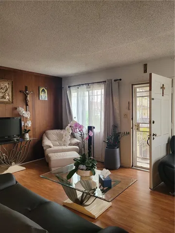a view of balcony with furniture