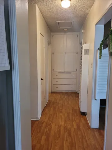 a view of a hallway view with living room