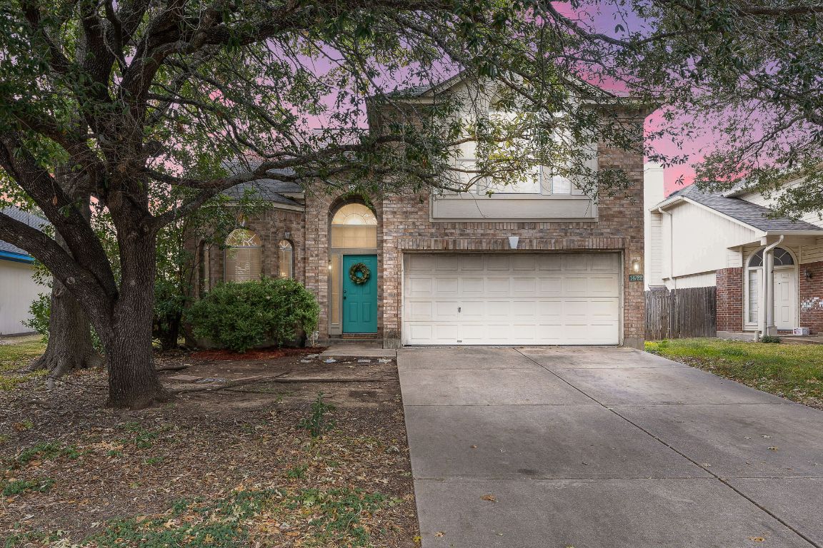 The front exterior showcases this inviting two-story home nestled in a highly desirable North Austin location.
