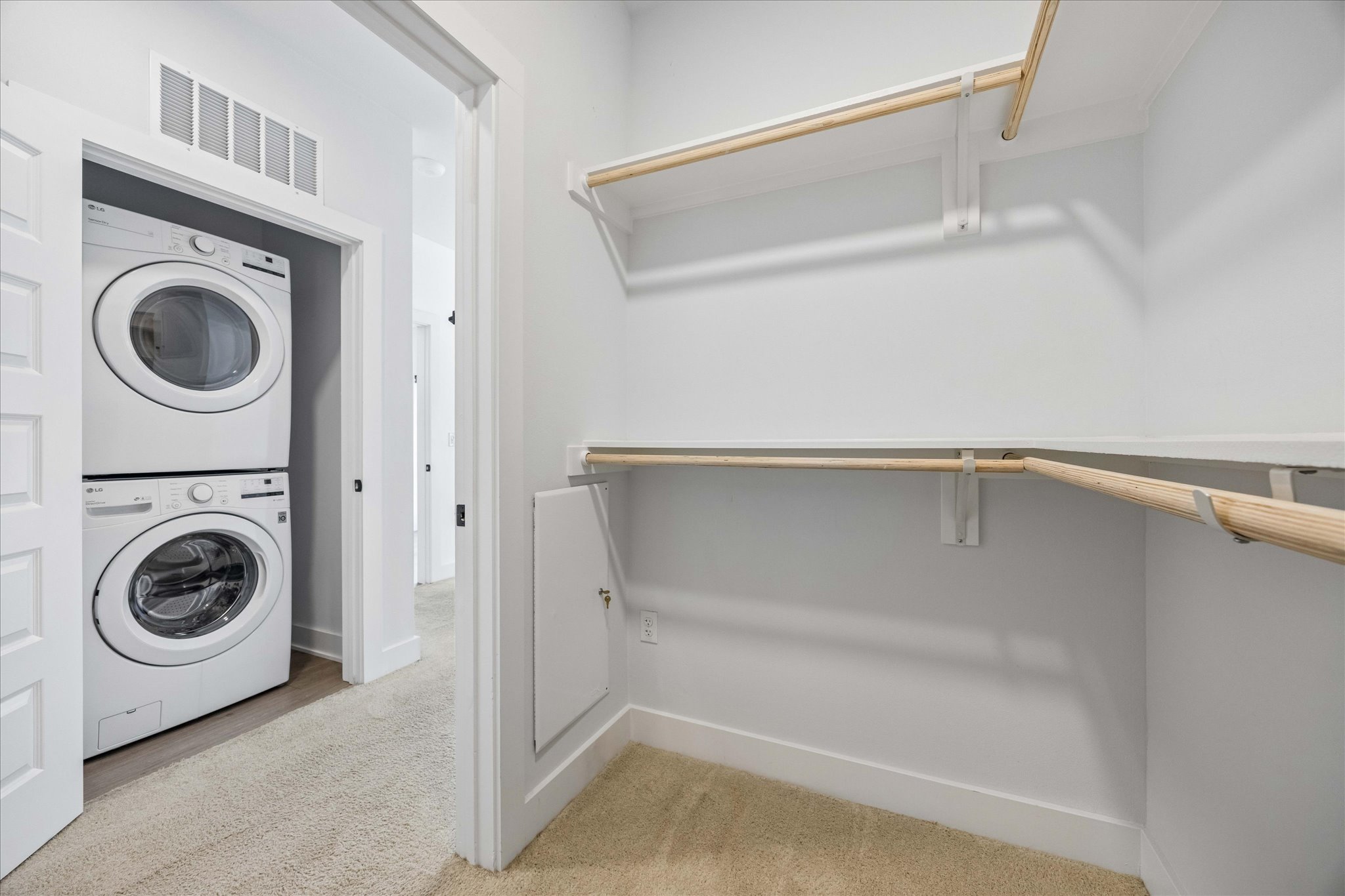 2220 Webberville Road, Unit 216 Austin, TX 78702 - Photo 20 of 26 Large Walk-in closet and Laundry Closet in the Primary Bedroom