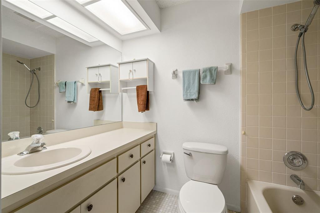 6665 Water Oak Court Spring Hill, FL 34606 - Photo 26 of 64 a bathroom with a sink toilet and shower