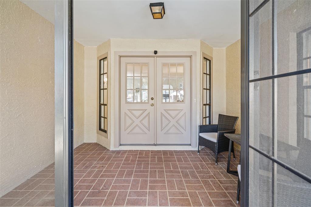 6665 Water Oak Court Spring Hill, FL 34606 - Photo 6 of 64 a view of an entryway with wooden floor