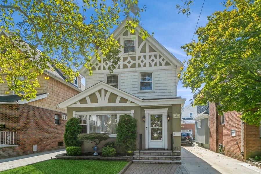 156 80th Street Brooklyn, NY 11209 - Photo 3 of 37 a front view of a house with garden