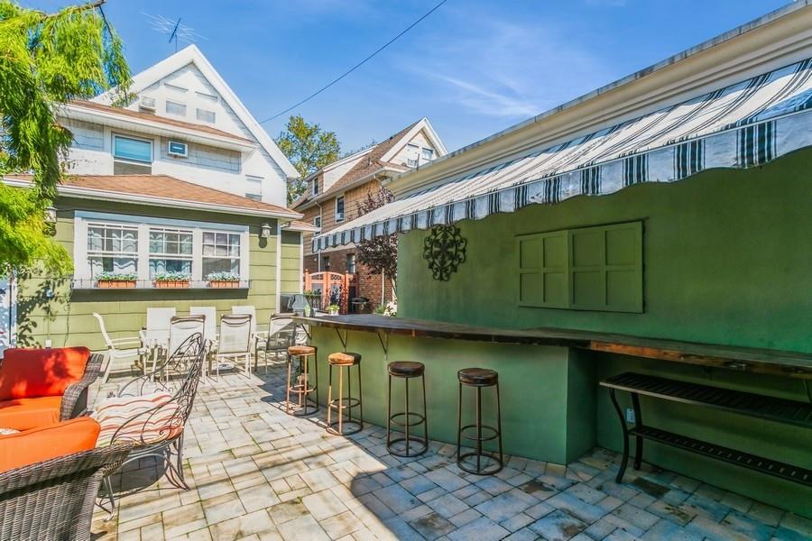 156 80th Street Brooklyn, NY 11209 - Photo 33 of 37 a view of a chairs and table in a patio