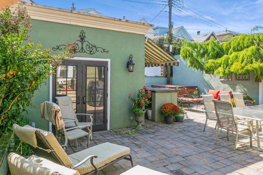 156 80th Street Brooklyn, NY 11209 - Photo 36 of 37 a view of a chair and table in backyard
