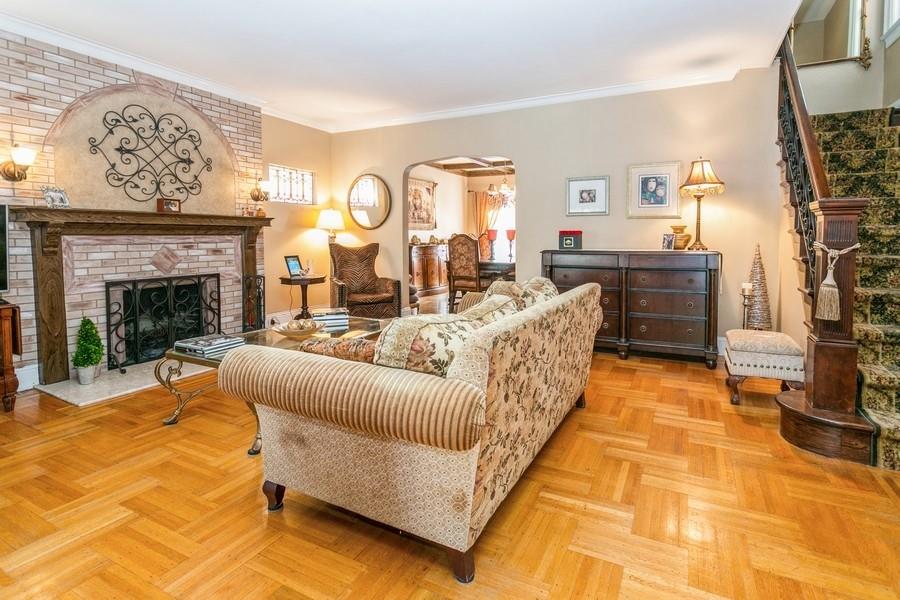 156 80th Street Brooklyn, NY 11209 - Photo 4 of 37 a living room with furniture and a fireplace