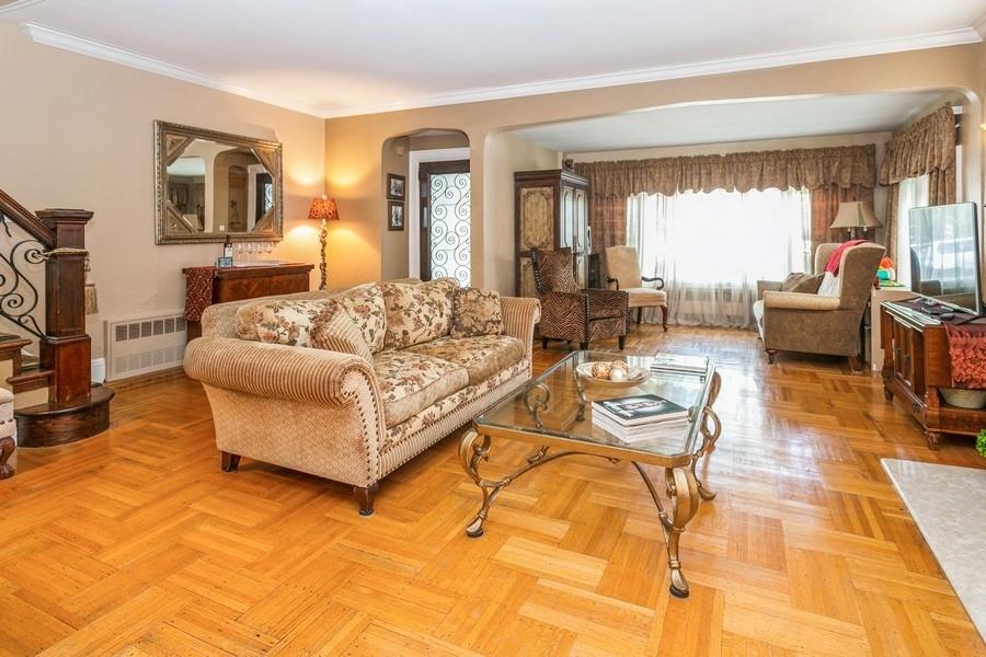 156 80th Street Brooklyn, NY 11209 - Photo 8 of 37 a living room with furniture and a rug