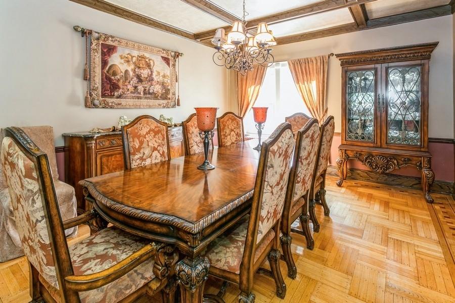 156 80th Street Brooklyn, NY 11209 - Photo 9 of 37 a view of a dining room with furniture a chandelier and a window