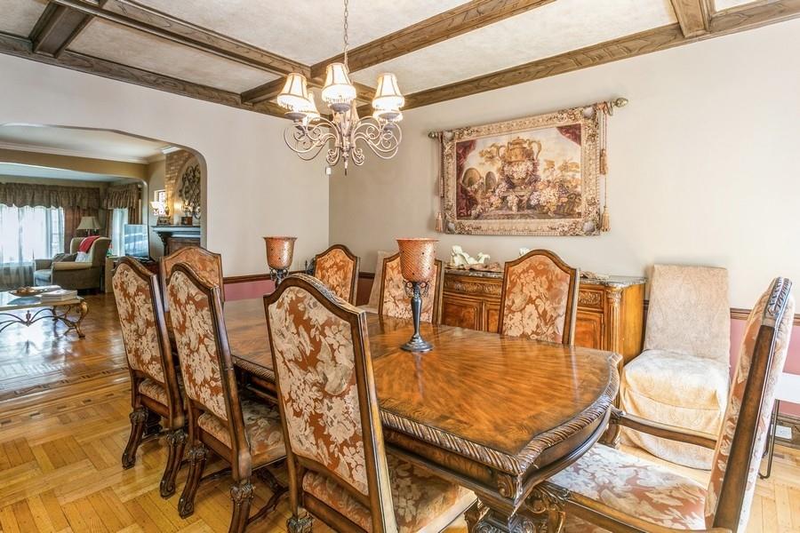 156 80th Street Brooklyn, NY 11209 - Photo 10 of 37 a dining room with furniture and chandelier