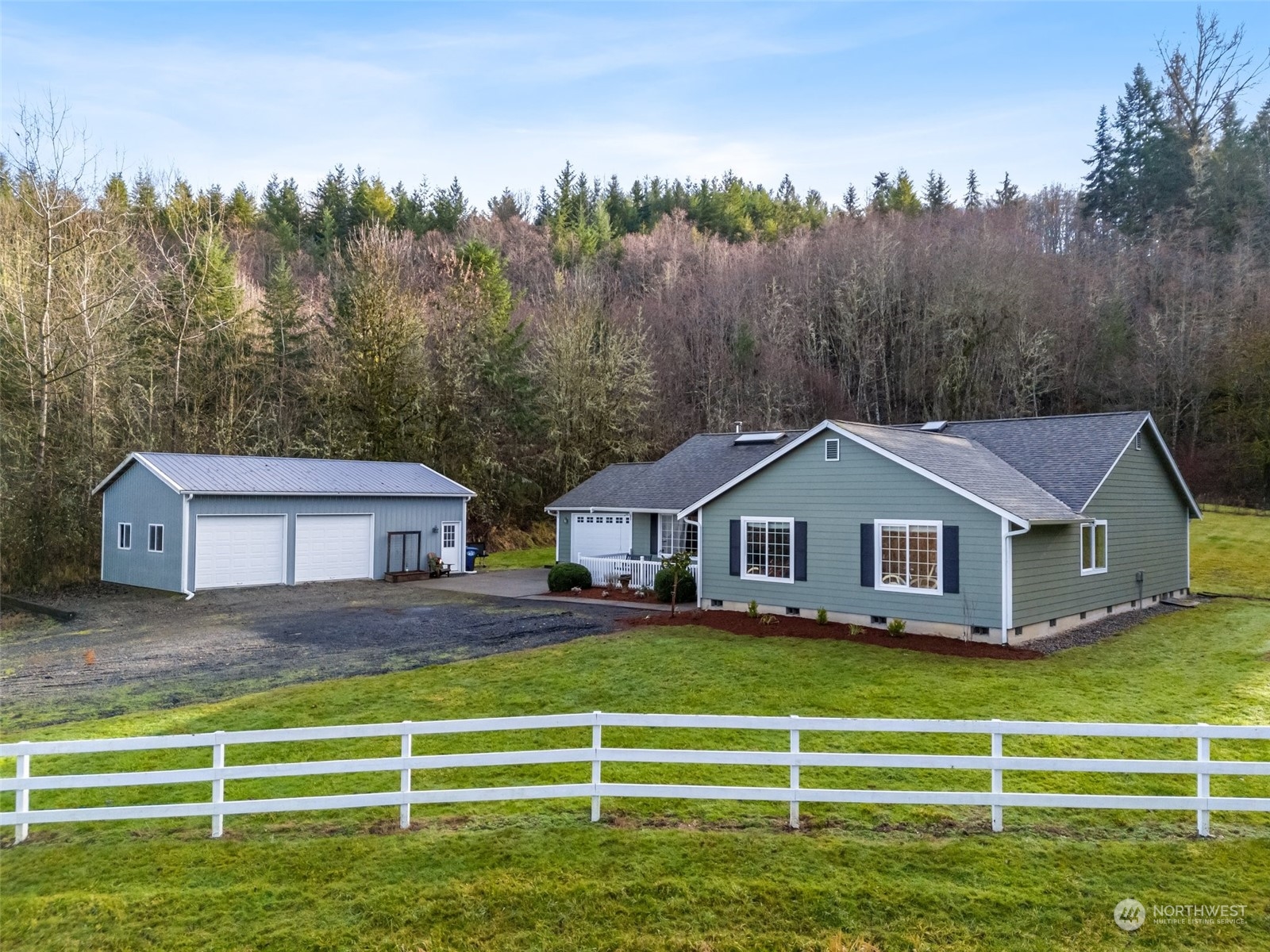 688 Evans Road Toledo, WA 98591 - Photo 1 of 40 a front view of a house with a yard