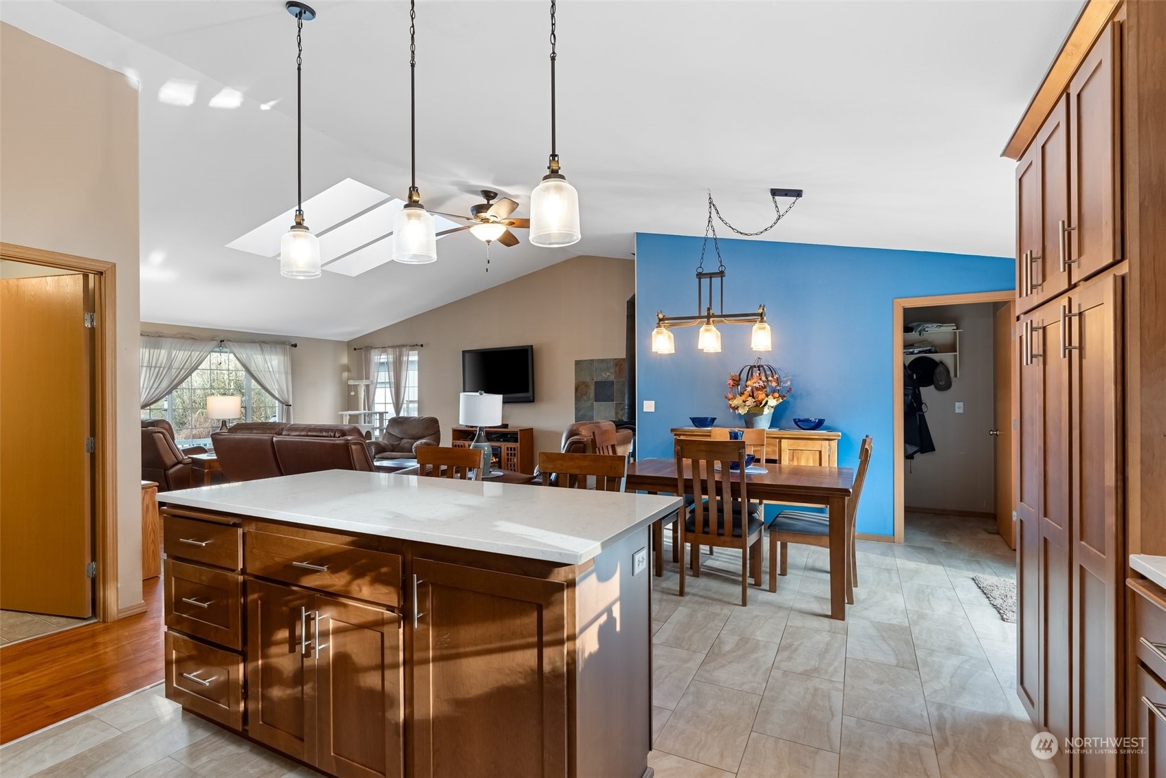 688 Evans Road Toledo, WA 98591 - Photo 12 of 40 a kitchen with a stove a refrigerator and a dining table
