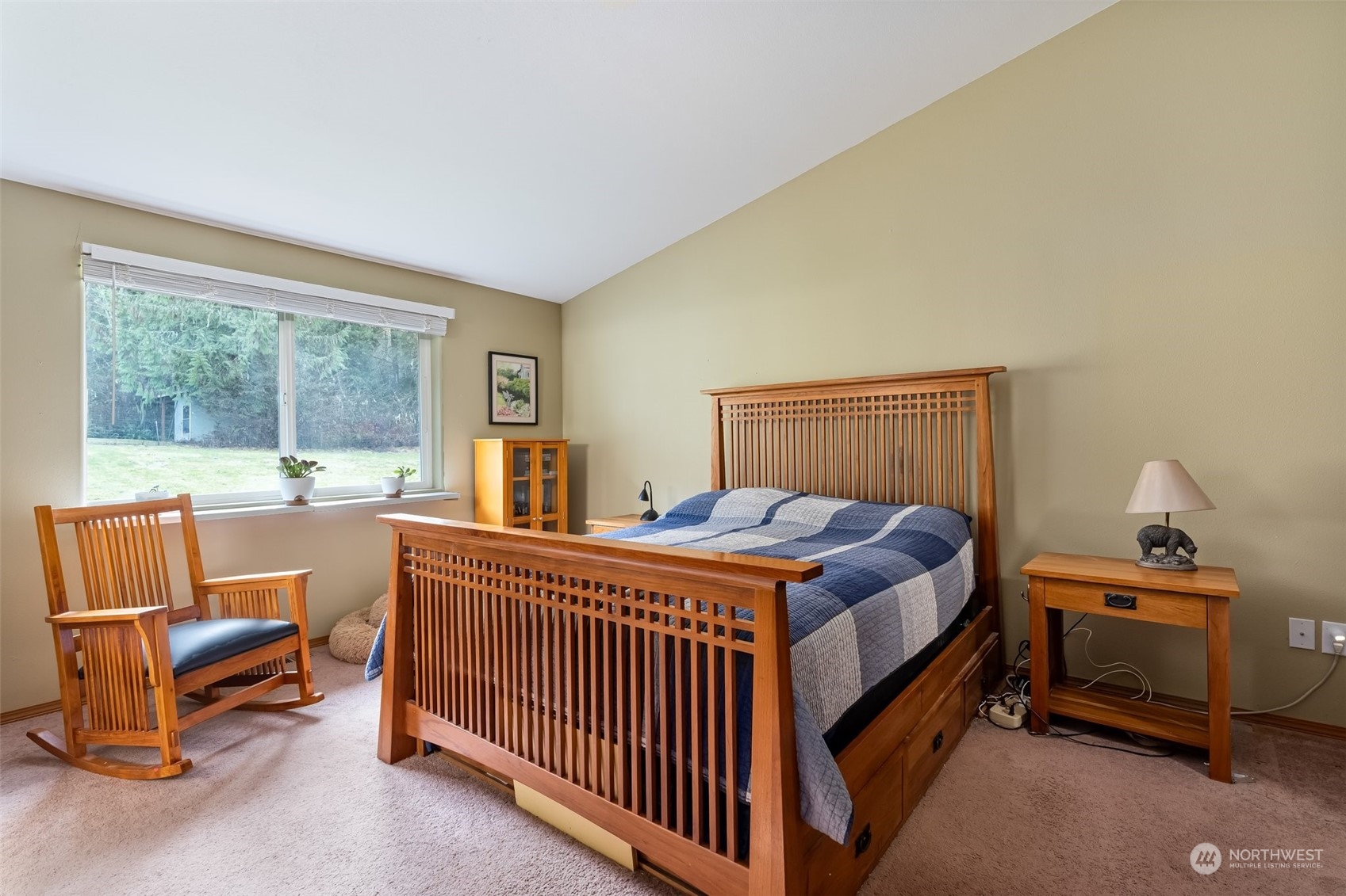 688 Evans Road Toledo, WA 98591 - Photo 17 of 40 a bedroom with a bed and a view of balcony