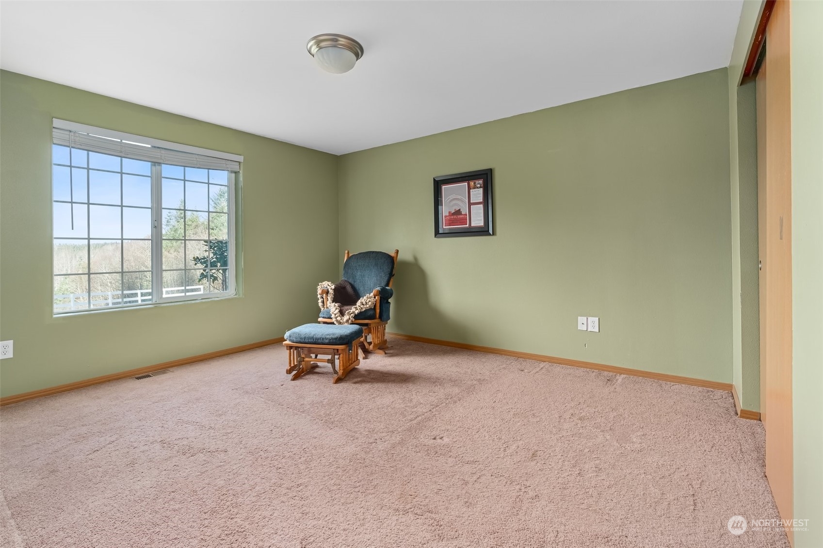 688 Evans Road Toledo, WA 98591 - Photo 23 of 40 a living room with a window
