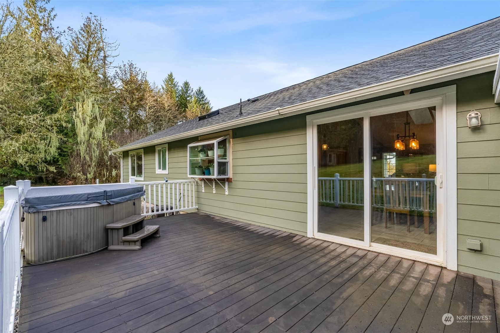 688 Evans Road Toledo, WA 98591 - Photo 28 of 40 a view of a house with a backyard and deck