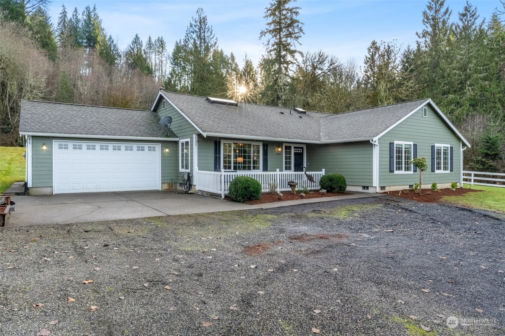 688 Evans Road Toledo, WA 98591 - Photo 3 of 40 a view of a house with a yard and large tree