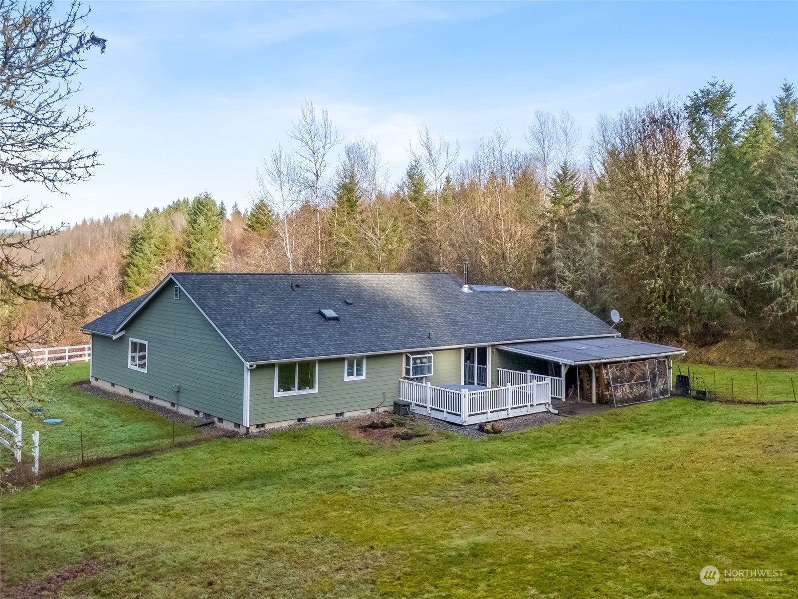 688 Evans Road Toledo, WA 98591 - Photo 31 of 40 a aerial view of a house with swimming pool next to a yard