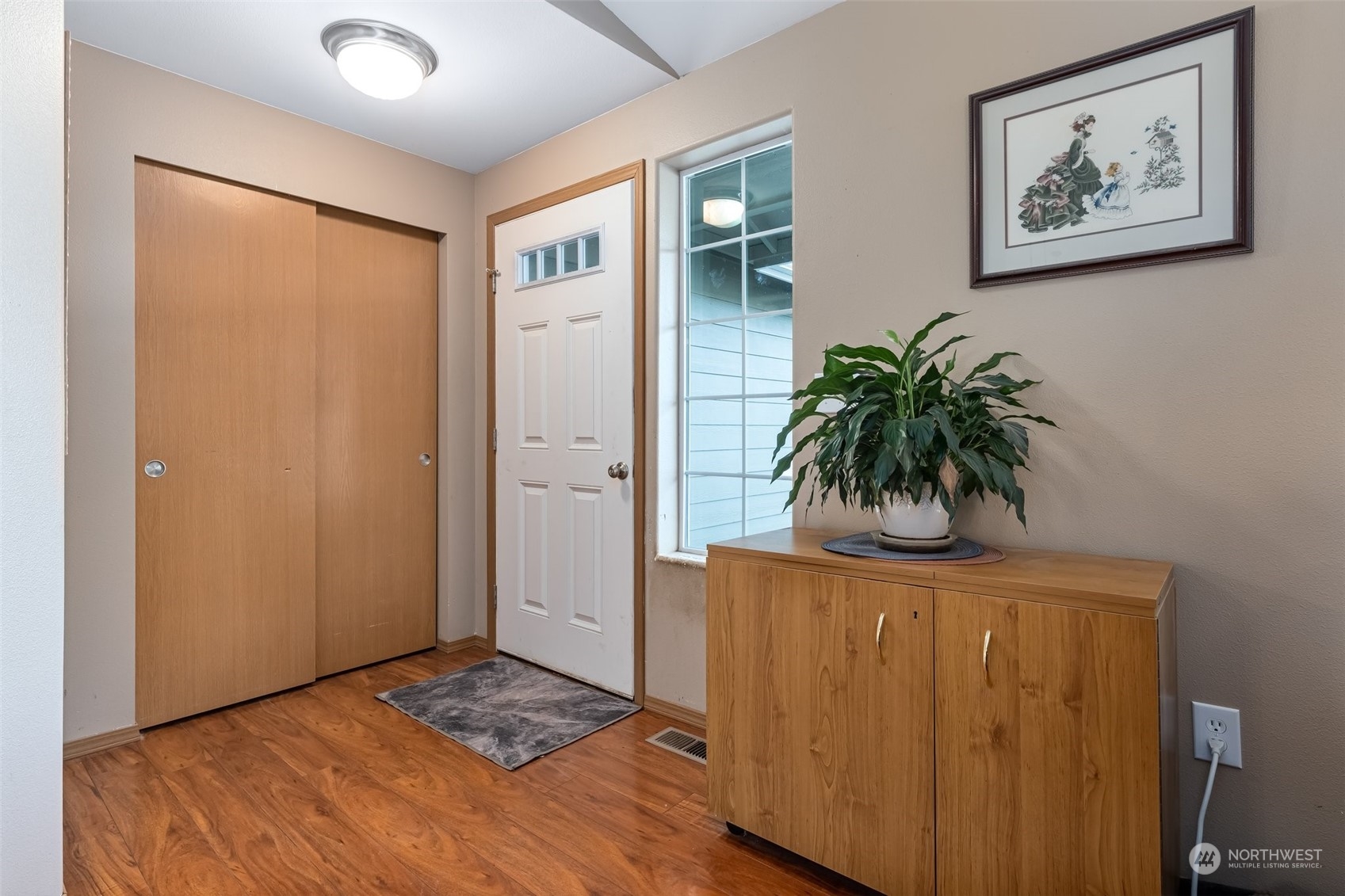 688 Evans Road Toledo, WA 98591 - Photo 5 of 40 a bedroom with a bed and a potted plant