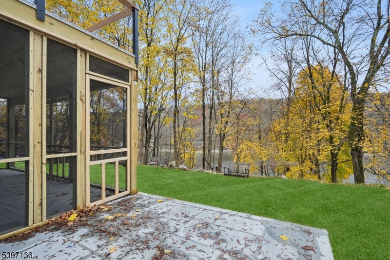 916 East End Road Newton, NJ 07860 - Photo 22 of 31 a view of a backyard with large trees